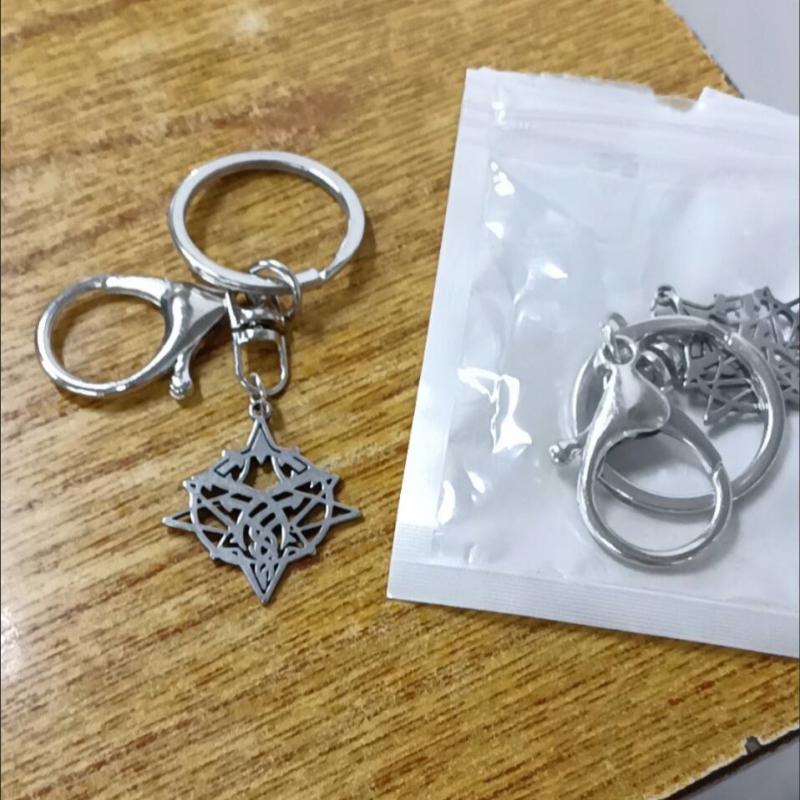ロード・オブ・ザ・ミステリーズ フールズ・ホーリー・エンブレ - Anime Merchandise Keychain のレビューと価格
